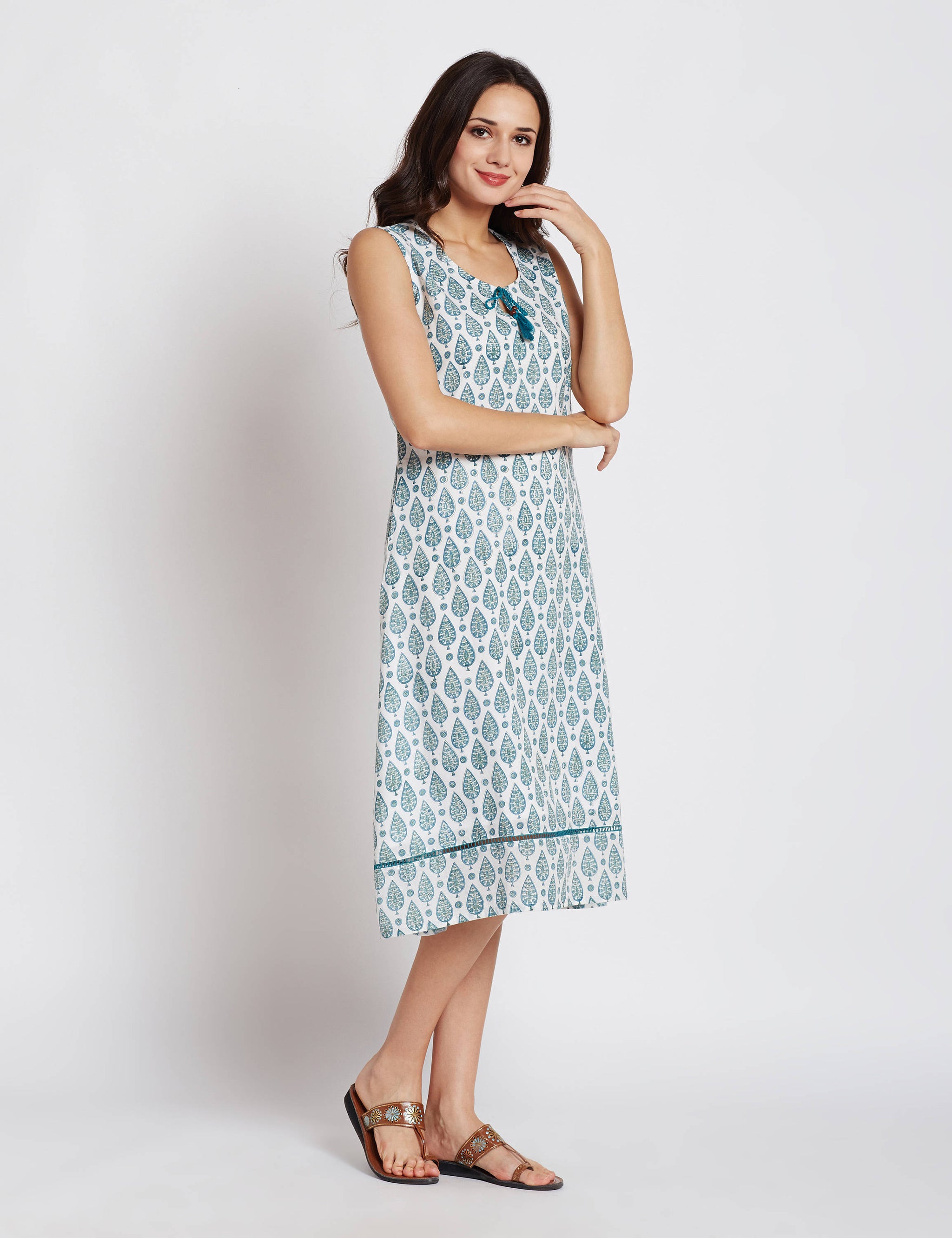 Hand block one piece sleeveless white dress with aqua green leaf print