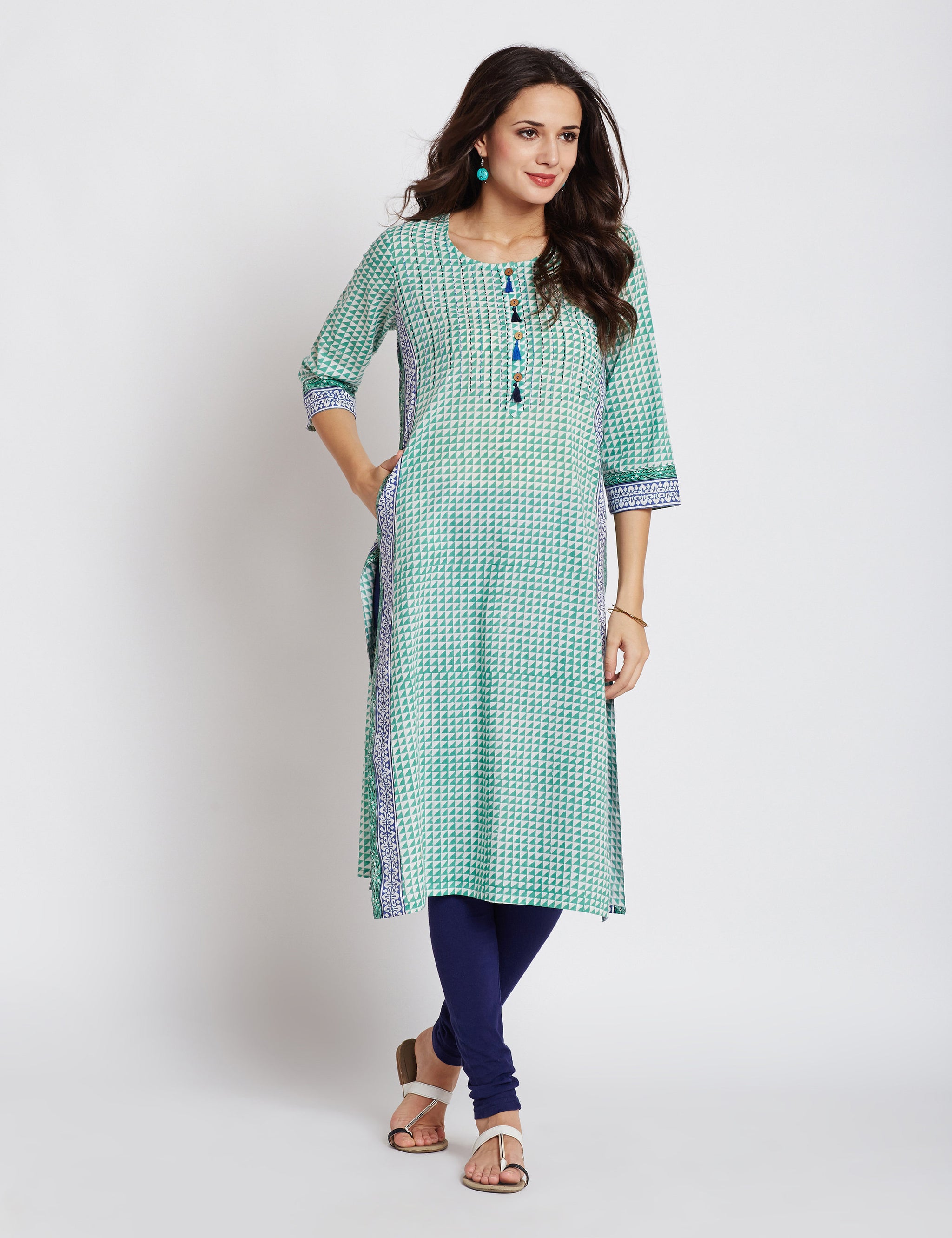Hand block printed ethnic long Indian pocket kurta with border detailing, kantha hand embroidery & tassels on front placket