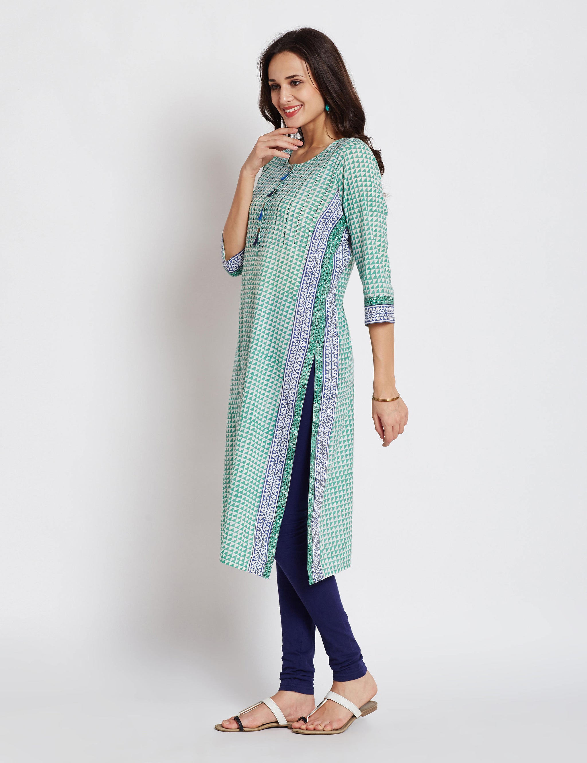 Hand block printed ethnic long Indian pocket kurta with border detailing, kantha hand embroidery & tassels on front placket