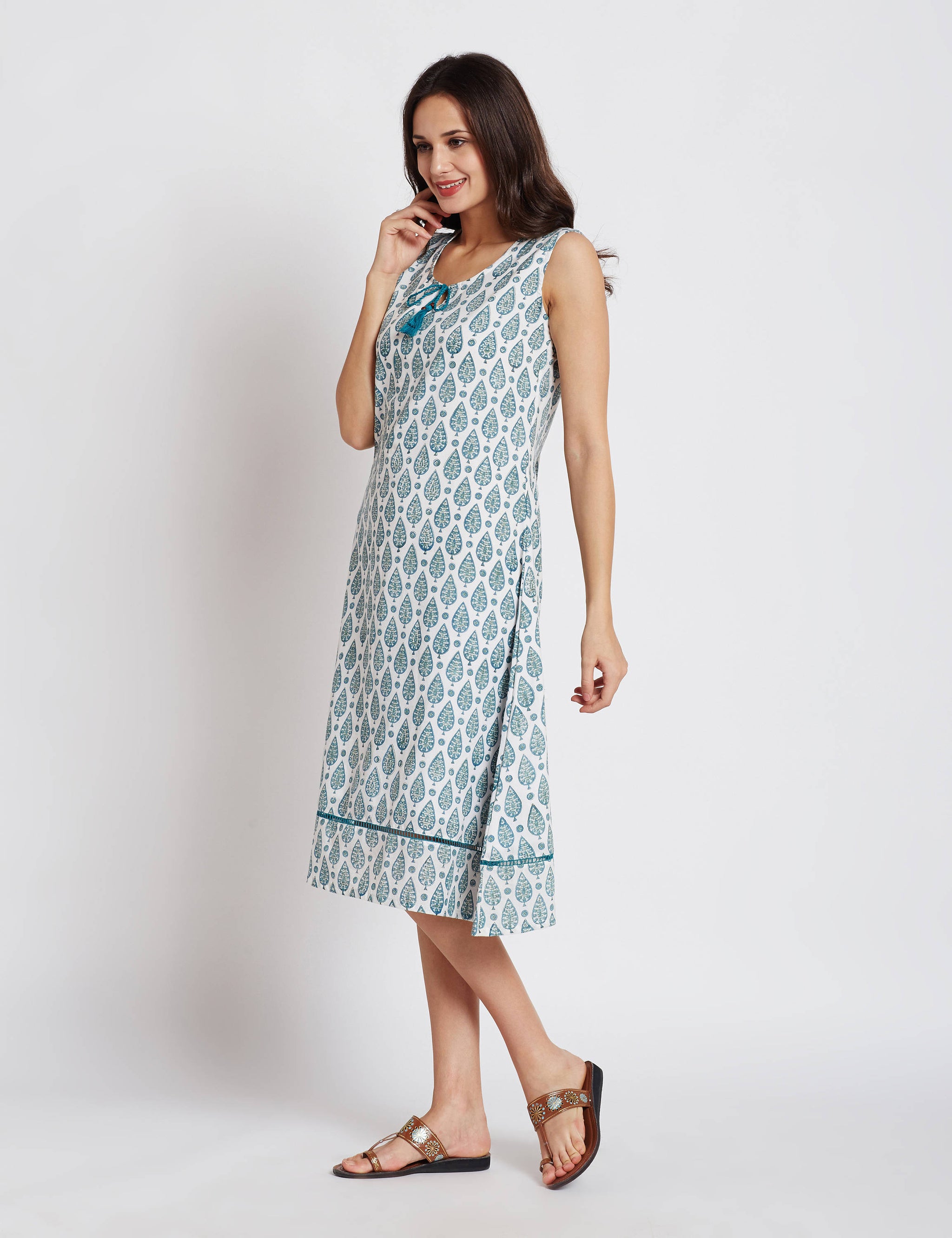 Hand block one piece sleeveless white dress with aqua green leaf print