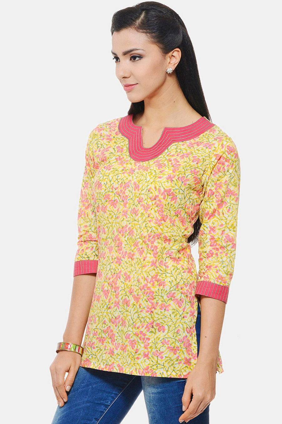 Hand Block printed Indian Kurti in yellow floral design with embroidery on neck and sleeves