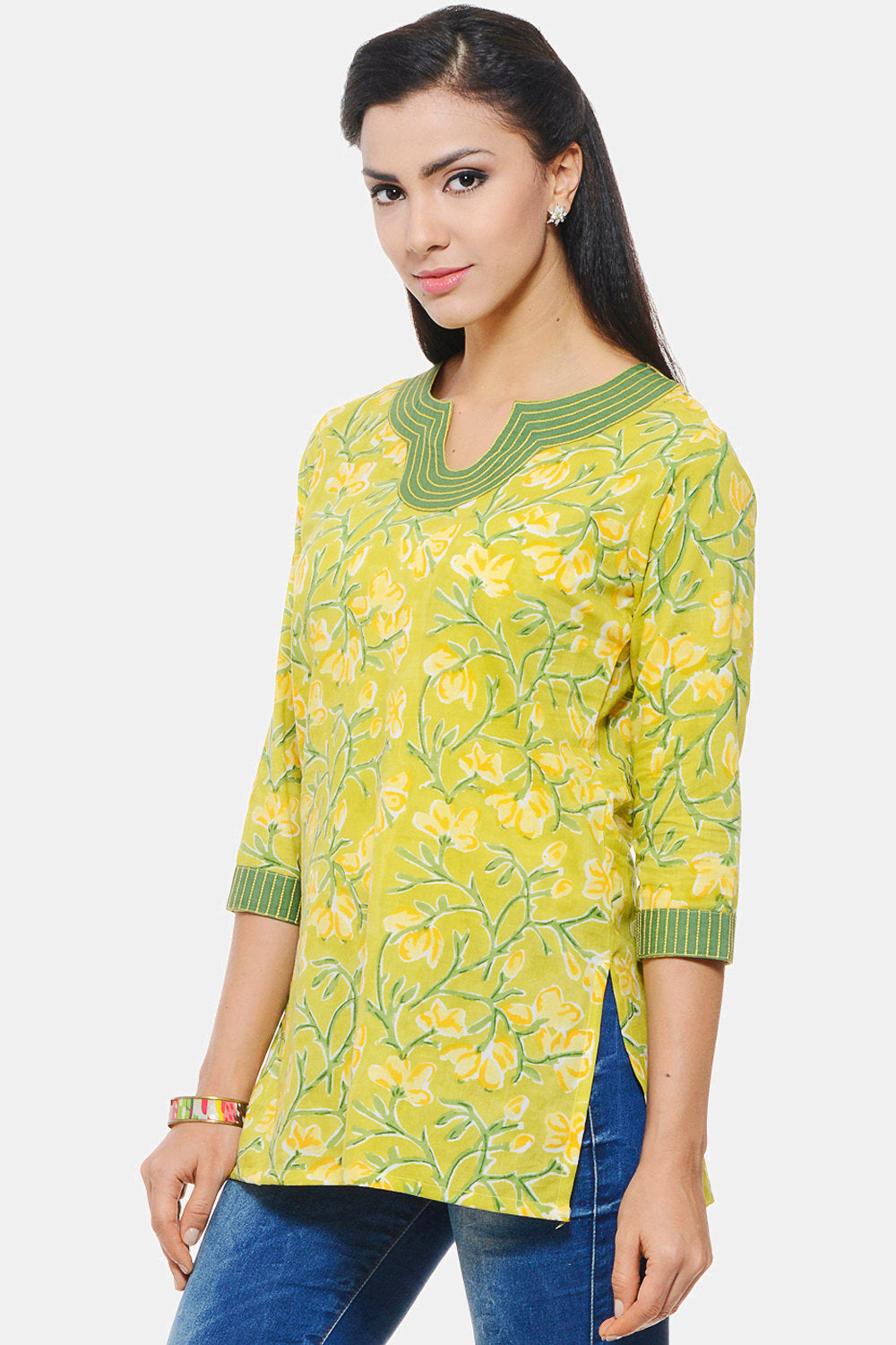 Hand Block Printed Indian Kurti in pastel green floral design with Embroidery on neck and sleeves