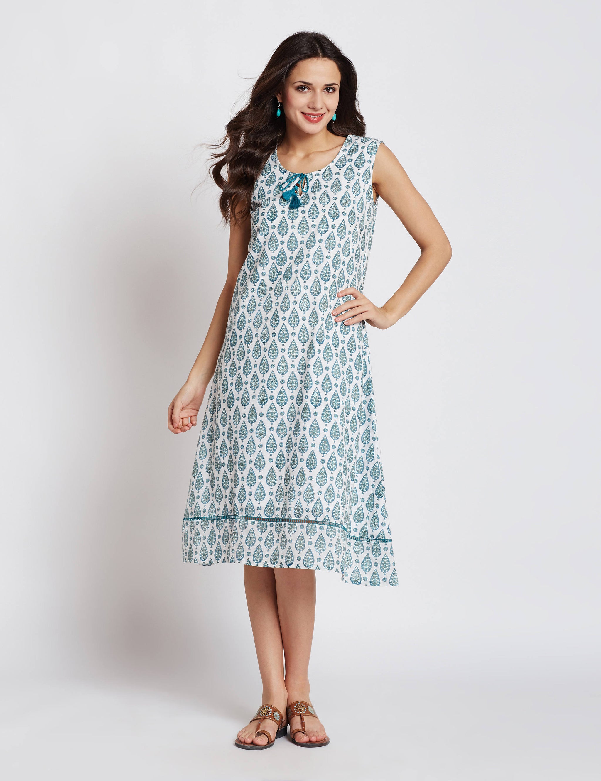 Hand block one piece sleeveless white dress with aqua green leaf print
