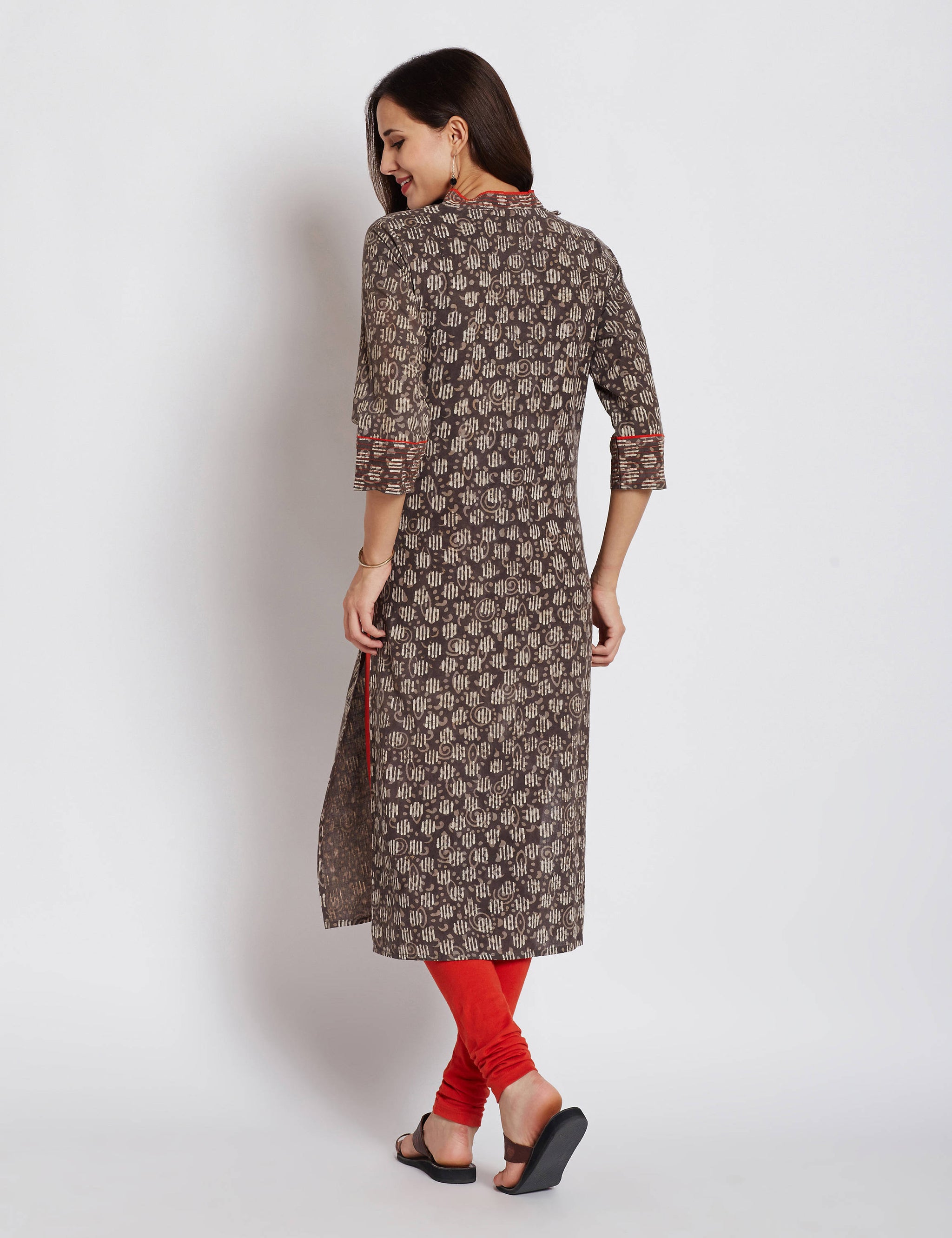 Hand block dabu printed ethnic long Indian kurta with contrast trims and orange hand embroidery on V neck and sleeves