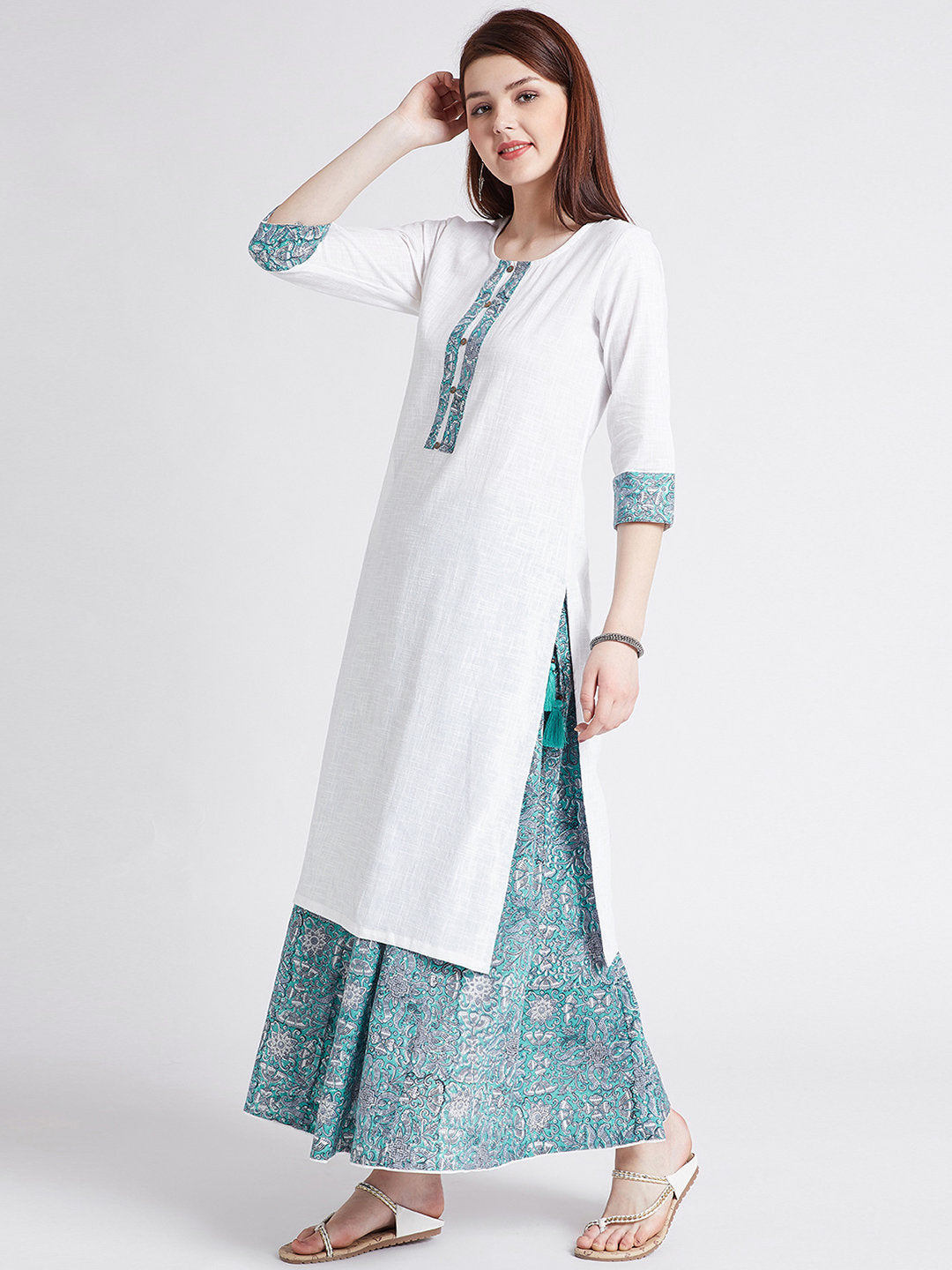 Hand block printed skirt with white long cotton kurta with detailing on neck, sleeves & slits