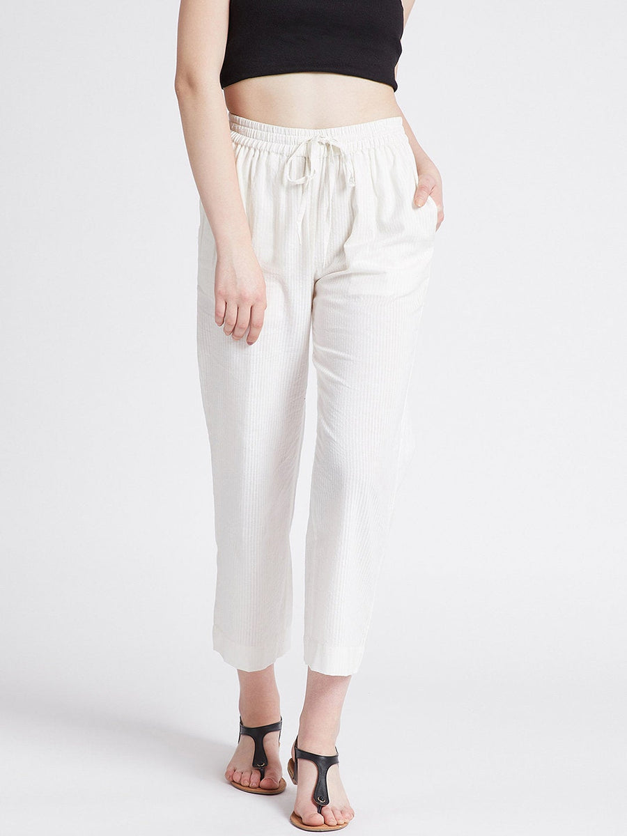 Off-white cotton straight pants with pockets