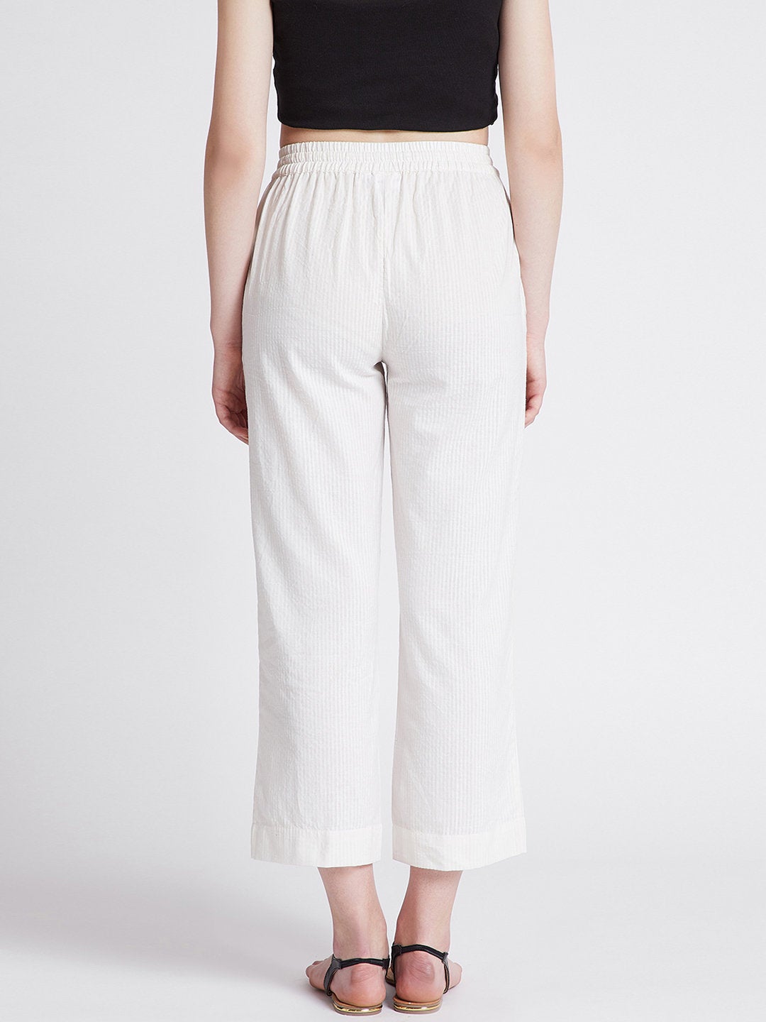 Off-white cotton straight pants with pockets