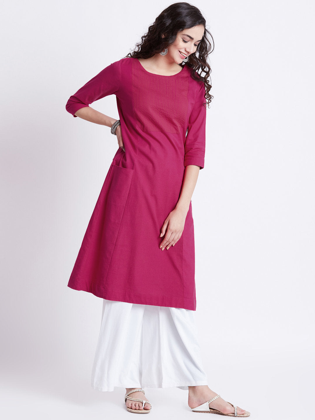 Indian ethnic long kurta with pockets in hot pink colour with embroidery detailing on yoke
