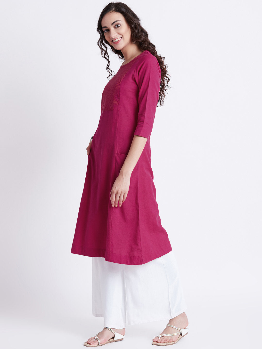 Indian ethnic long kurta with pockets in hot pink colour with embroidery detailing on yoke
