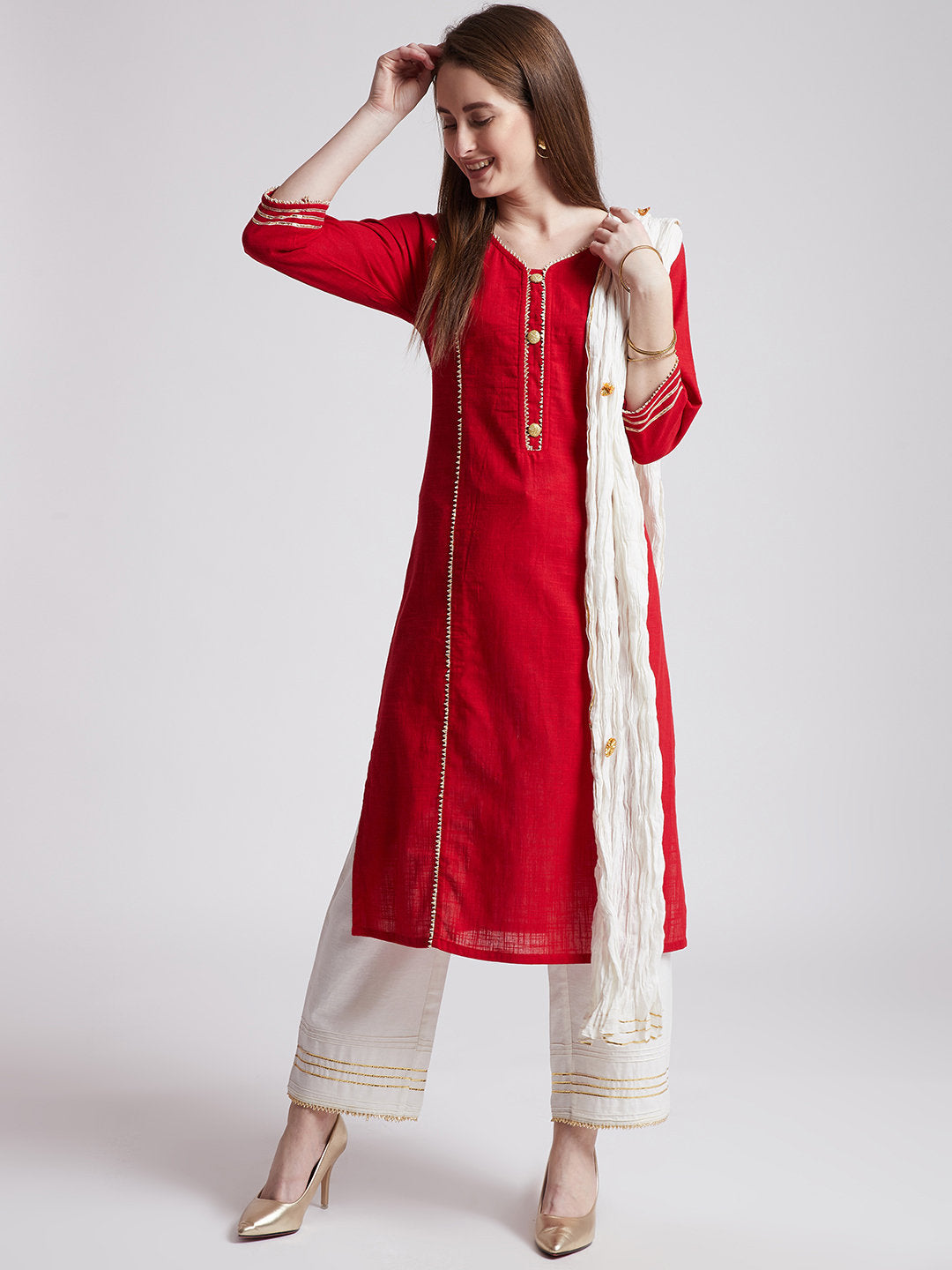 Indian ethnic long kurta in red colour with pants & stole with gota detailing