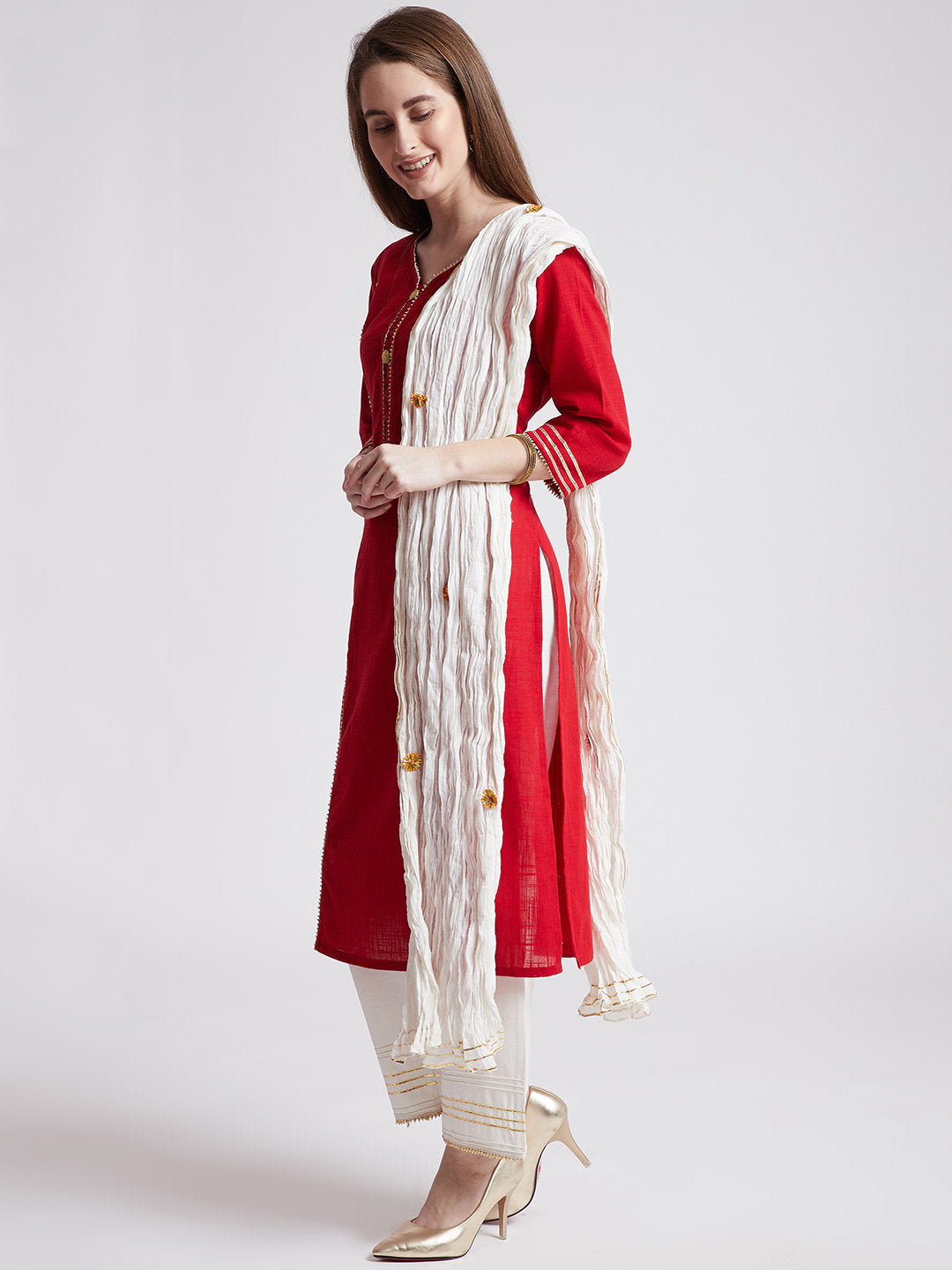 Indian ethnic long kurta in red colour with pants & stole with gota detailing