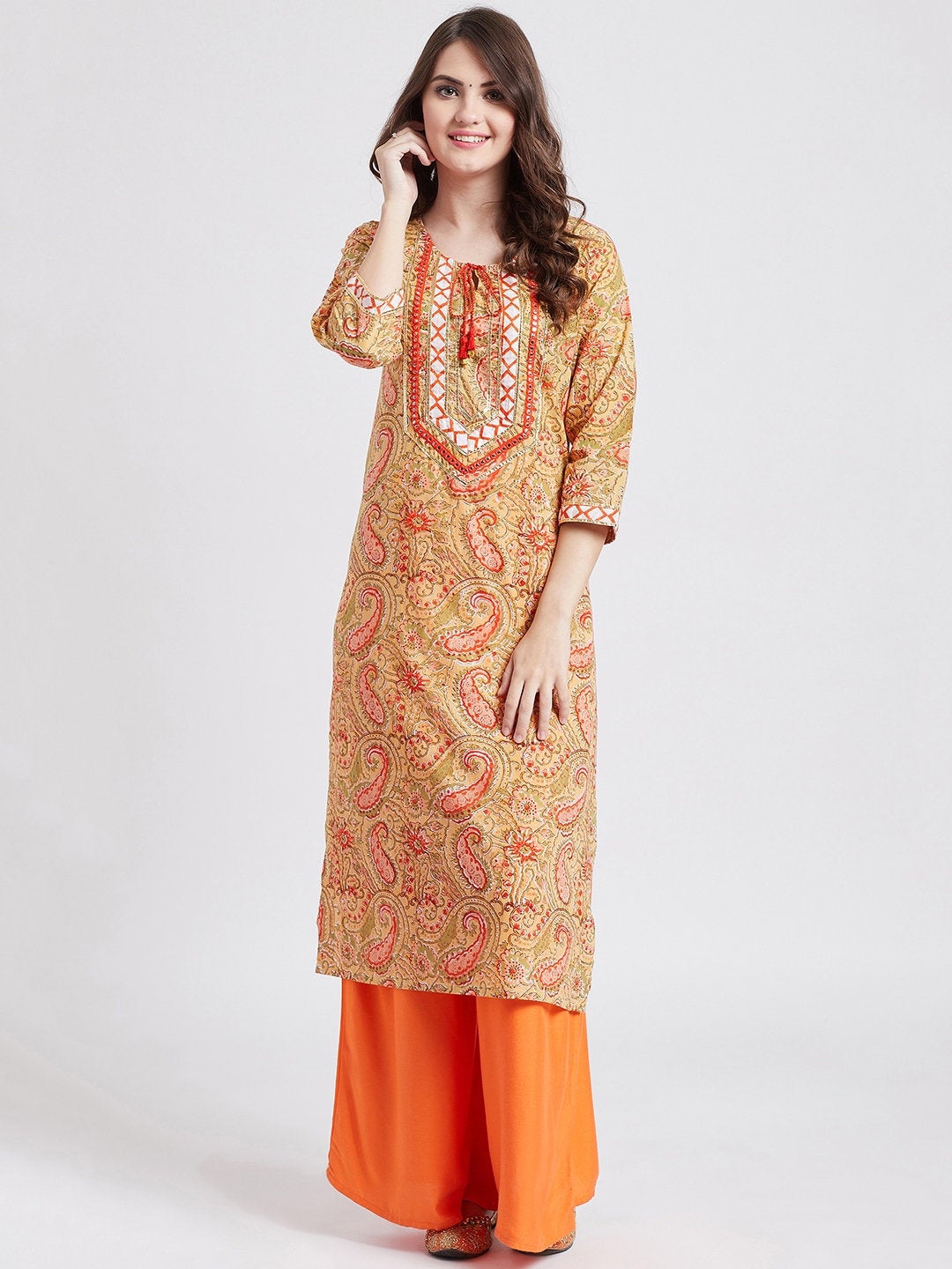 Indian ethnic orange long kurta with gota detailing