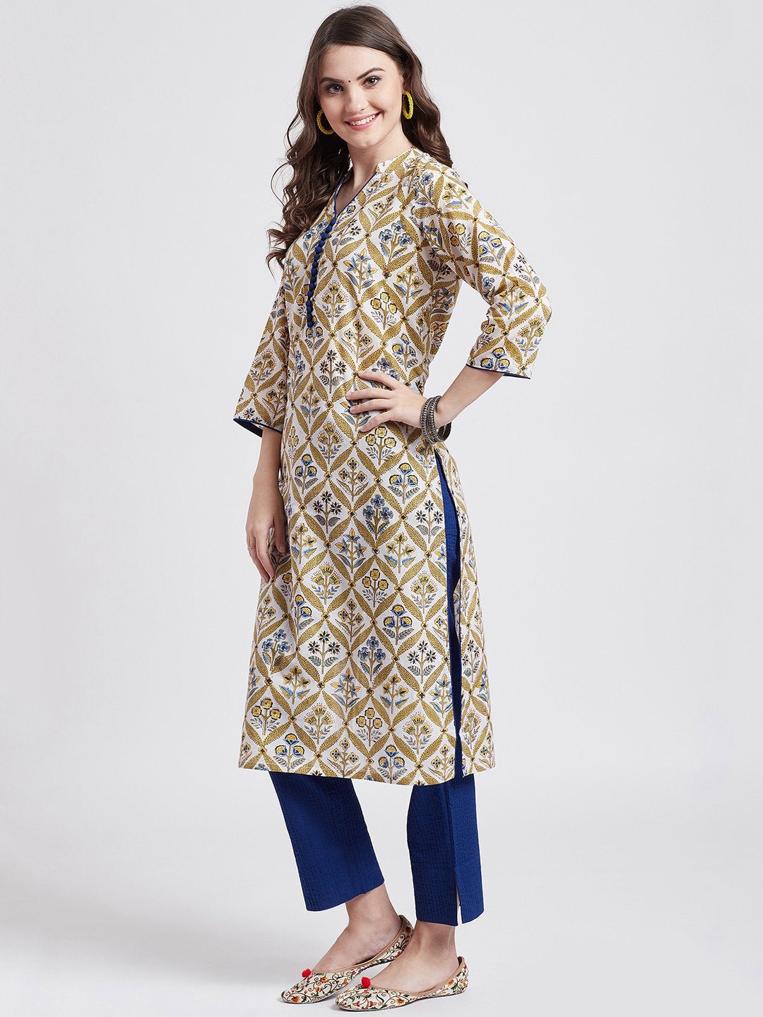Hand block printed white kurta with self embroided blue cotton straight pants